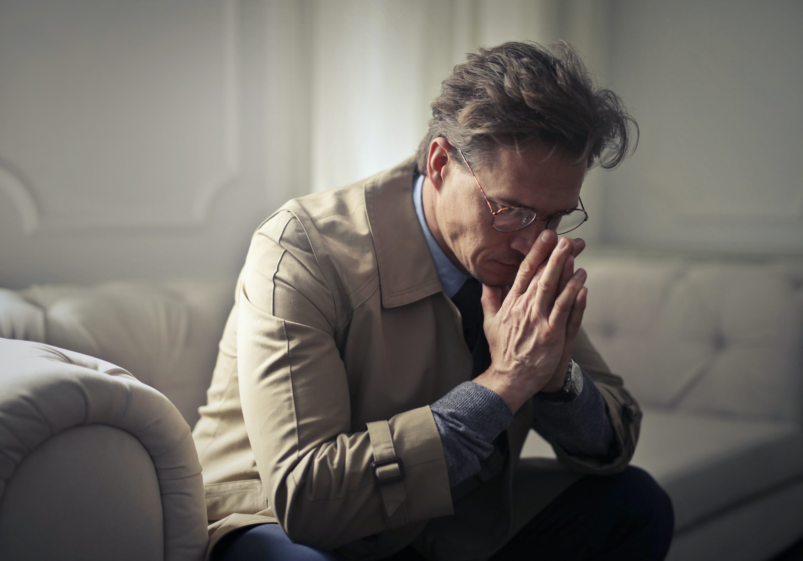 upset man feeling the effects of divorce